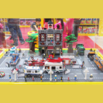 city built from legos, yellow banners