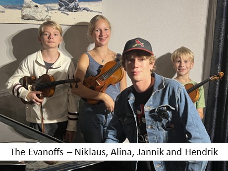 The Evanoff Children - Niklause Alina Janik and Hendrik - Holding their instruments.