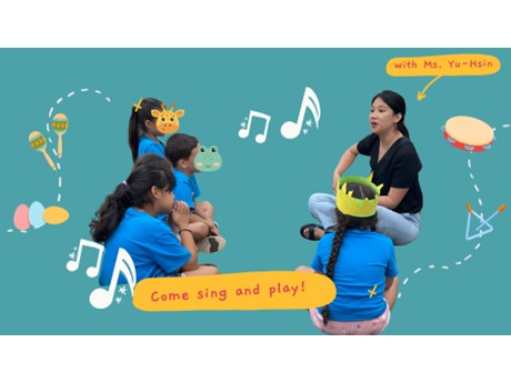 Ms. Hu Tsin playing music and singing with children