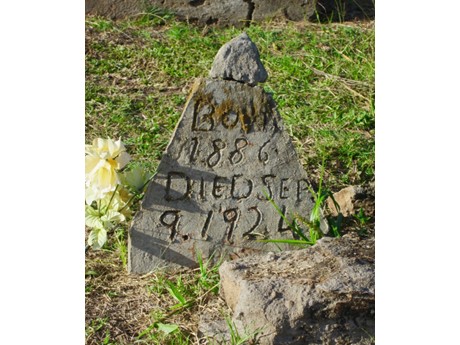 A stone with engrave text on it.