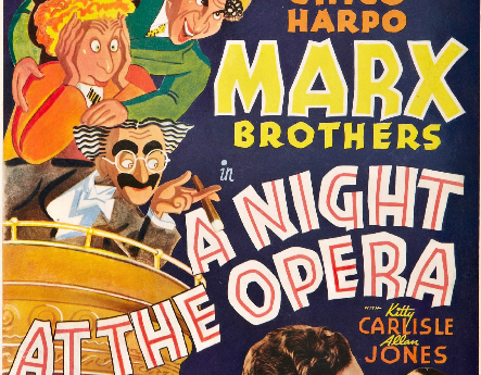 Photo of the cover of the DVD, "A Night at the Opera," starring the Marx Brothers. Cartoons of the Marx Brothers on a cruise ship have the movie title superimposed over it.
