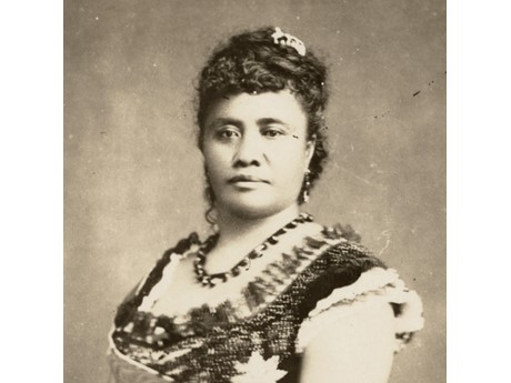A black and white portrait of Queen Liliuokalani in regalia