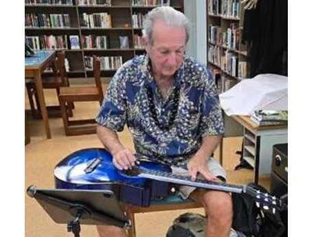 Daniel Tremblay playing the Hawaiian Steel Guitar in Waikiki-Kapahulu Library