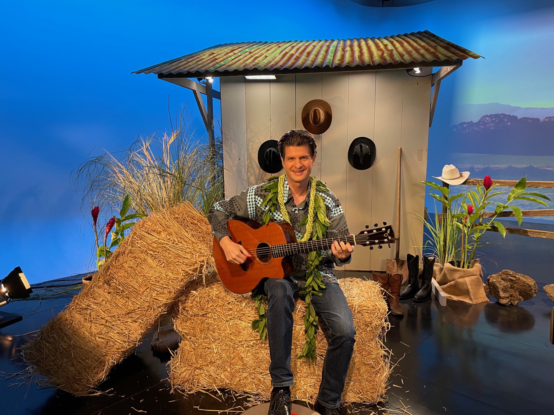 Jeff Peterson on set witih guitar