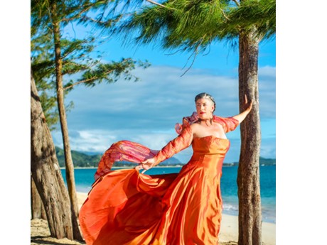 Mezzo-soprano opera diva, Sarah Connelly posing beachside Windward Oahu