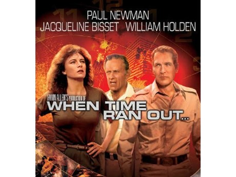 DVD cover of the movie, "When Time Ran Out." Jacqueline Bisset, William Holden, and Paul Newman stand before an orange, on-fire city scape.
