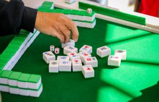 person playing mahjong