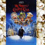 popped popcorn background, muppet christmas carrol dvd cover in the center