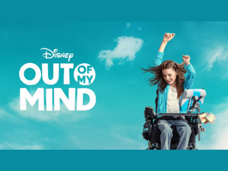 Girl in wheel chair appears happy against a background of a blue sky. Text reads: Disney. Out of my Mind.