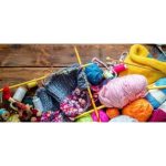 A colorful assortment of crochet, knitting and sewing supplies