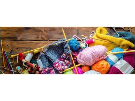 A colorful assortment of crochet, knitting and sewing supplies