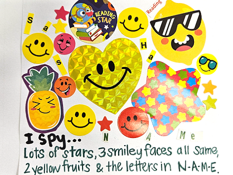 stickers: smiley faces, stars, a pineappple, a lemon, letters in NAME