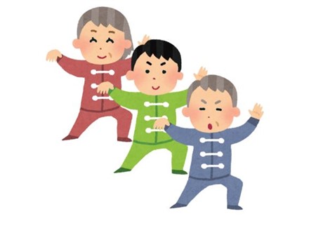 Three adults practicing tai chi