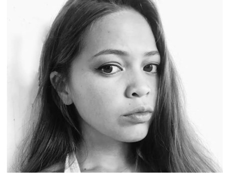 Black and white headshot of artist Angaea Cuna
