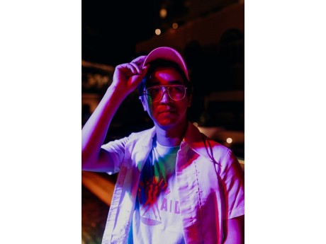 Sean Choo wearing a hat and glasses
