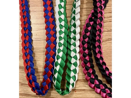 a set of 3 braided satin ribbon leis in different colors