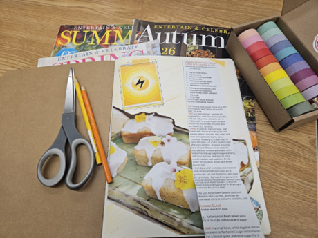 photo of journal, magazines, washi tape and scissor and pencil