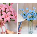Images of flowers made with pipe cleaners- pink lilies and clusters of little blue flowers.