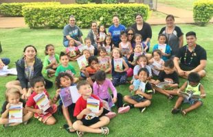 Picture of children and families with books