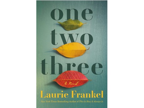 A green book cover with leaves
