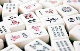 close-up image of scattered mahjong tiles
