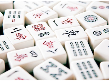 close-up image of scattered mahjong tiles