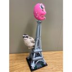 pink and light brown sloths on eiffel tower