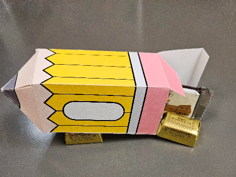 pencil papercraft box with cardstock and filled with chocolate