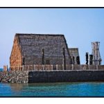Ahu'ena Heiau in Kamakahonu Bay Kailua-Kona; wooden structure on rock platform in ocean
