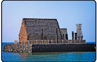 Ahu'ena Heiau in Kamakahonu Bay Kailua-Kona; wooden structure on rock platform in ocean