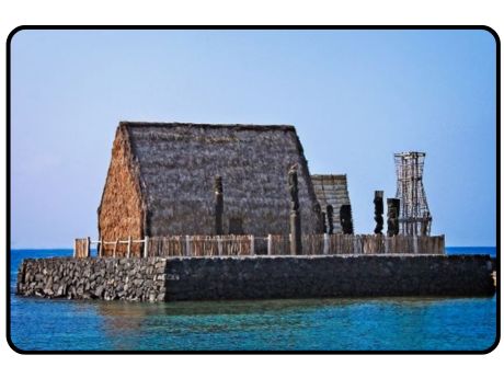 Ahu'ena Heiau in Kamakahonu Bay Kailua-Kona; wooden structure on rock platform in ocean