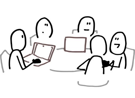 cartoon figures chatting at a table with laptops