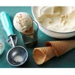 vanilla ice cream with scoop, cones, and sprinkles