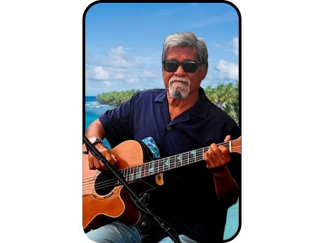 musician Dannny Almonte holding guitar