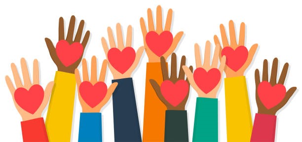 hands raised in the air with hearts on the palm of each hand