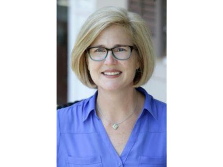 Woman's portait with glasses, short blond hair
