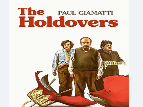 Two teachers and a student standing together.