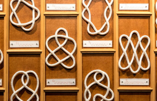 Various styles of knots partitioned off in frames, with labels underneath each type of knot.