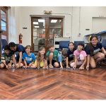 kids lined up to race brush bots