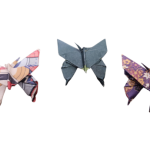 three origami butterflies in a row