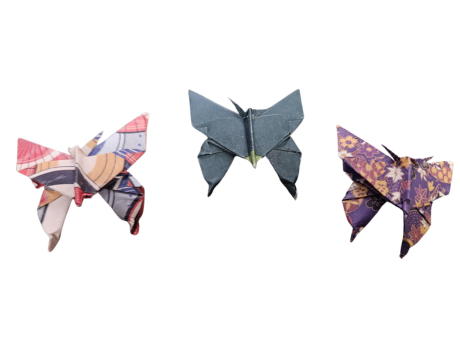 three origami butterflies in a row