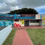 Exterior photo of Kalihi-Pālama Library with new Taking Flight Mural