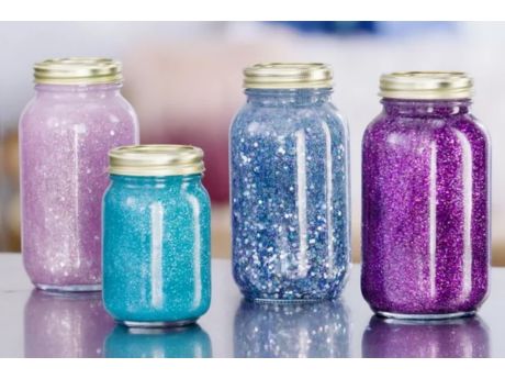 jars with colorful glitter inside