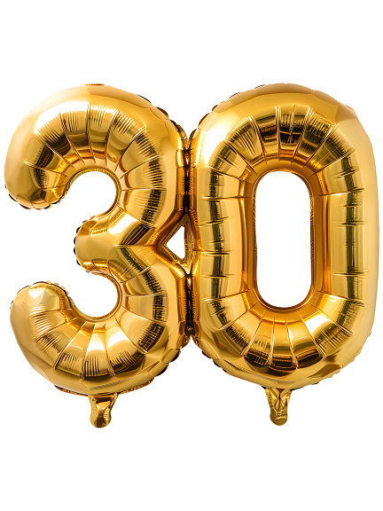 A picture of gold-colored mylar balloons in the shape of the number "30"