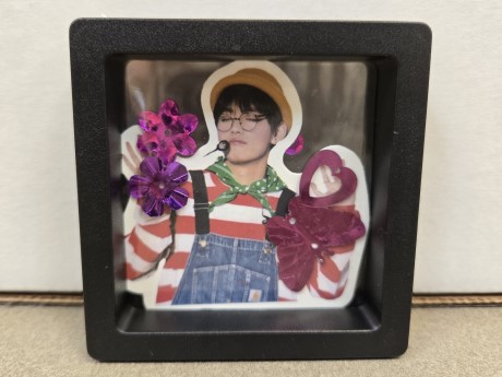 black box with sticker and confetti