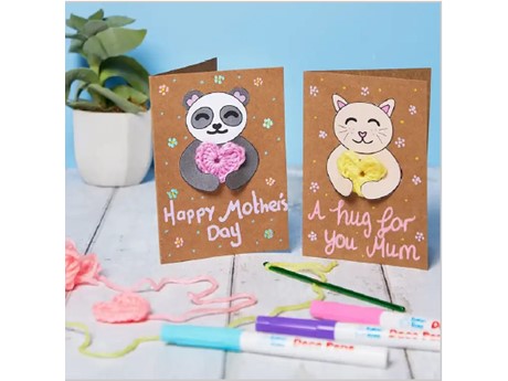 two handmade cards with a crochet heart
