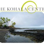 Words The Kohala Center logo over photo of Kahaluʻu Bay, ocean, lava rocks, rainbow
