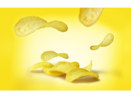 potato chips on a yellow background
