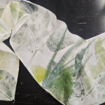 white scarf printed with leaf stamping