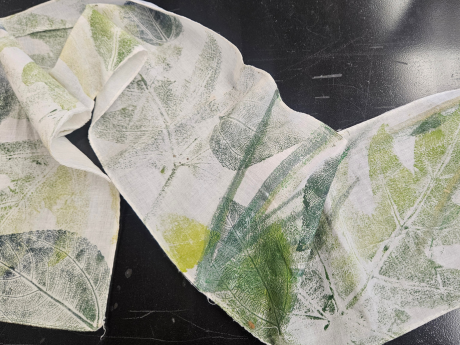 white scarf printed with leaf stamping